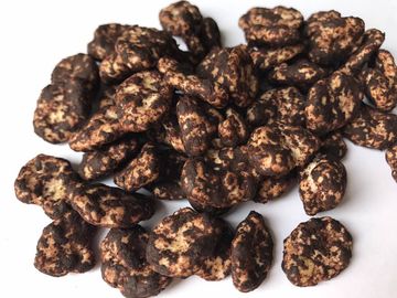 A textura friável do sabor doce Nuts da fava do chocolate mantém-se em condições frescas