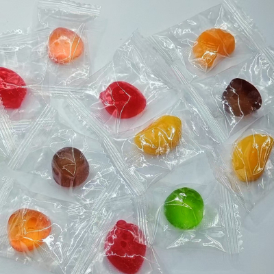 Doces de goma coloridos embalados individualmente para festas Eventos Prazer cotidiano